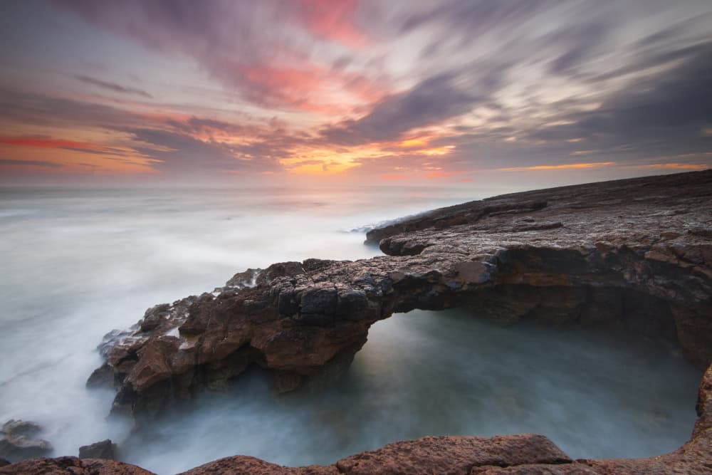 Sunset Sea Arch by Paulo Nogueira — canvas wall art