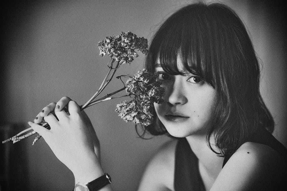 Pensive Woman Dried Flowers by Masatoshi Washimi — canvas wall art