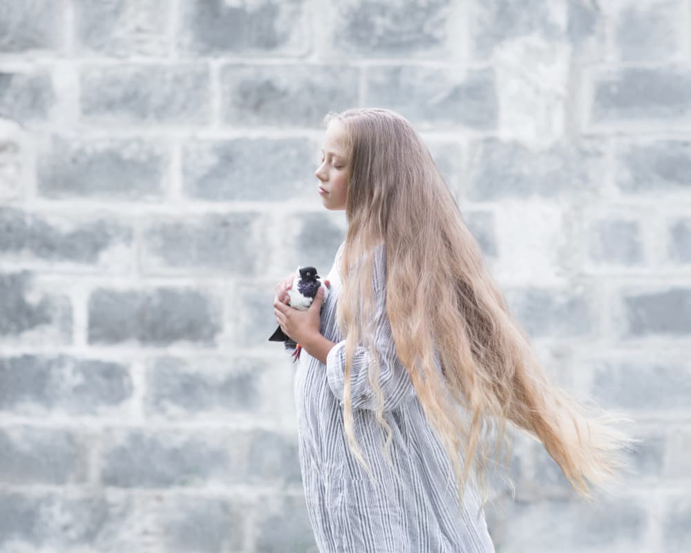 Gentle Girl And Bird by Małgorzata Masarz — canvas wall art