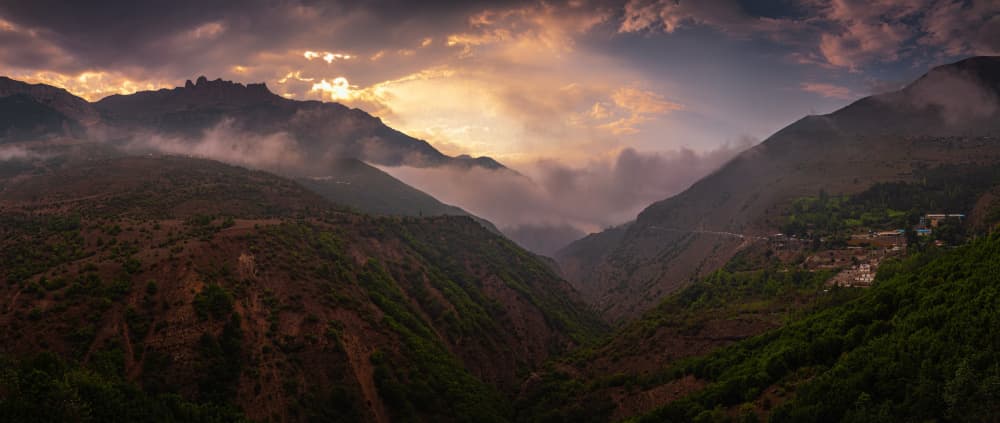 Misty Valley Village Sunset by Ali Barootkoob — canvas wall art