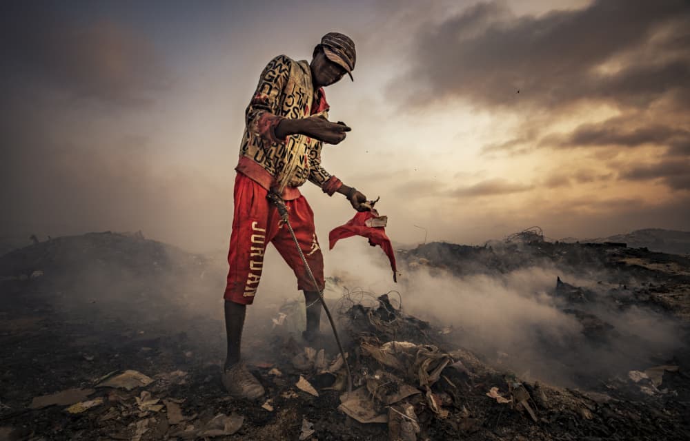 Scavenger In Smoky Landfill by João Coelho — canvas wall art