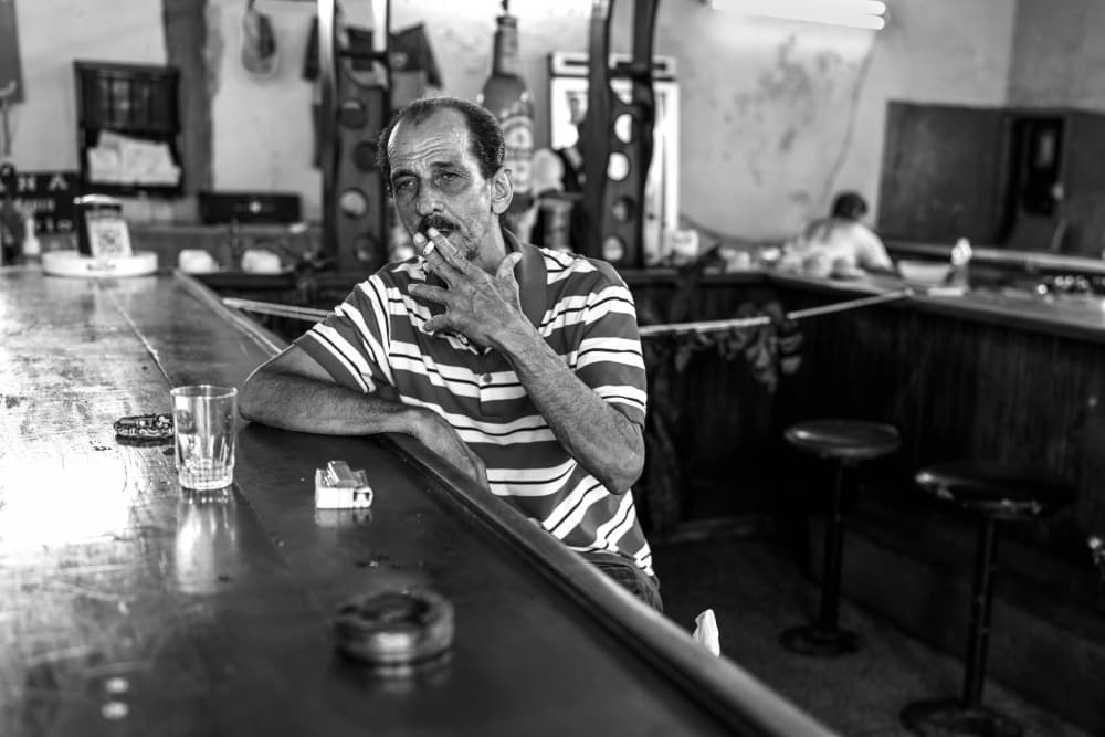 Man Smoking at Bar by Ken Frank — canvas wall art