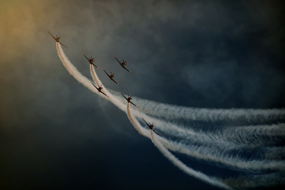 Aerobatic Smoke Trails by Antonio Grambone — canvas wall art