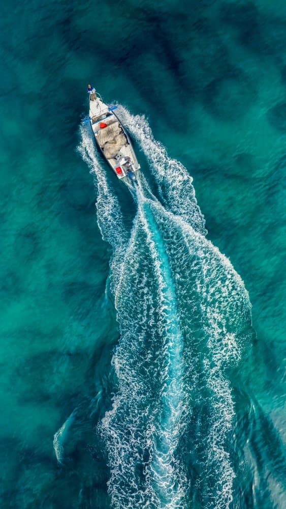 Speedboat On Azure Sea by Ido Meirovich — canvas wall art