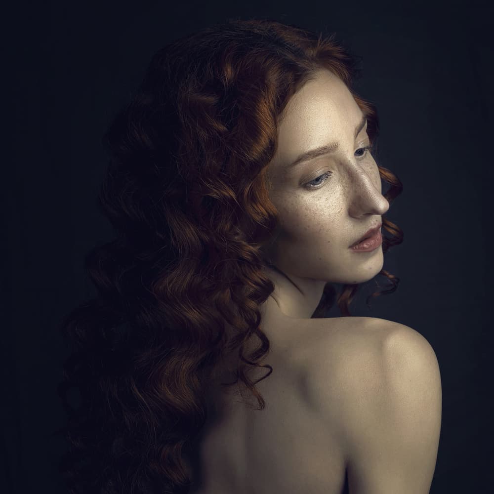 Pensive Redhead Portrait by Lech Radecki — canvas wall art
