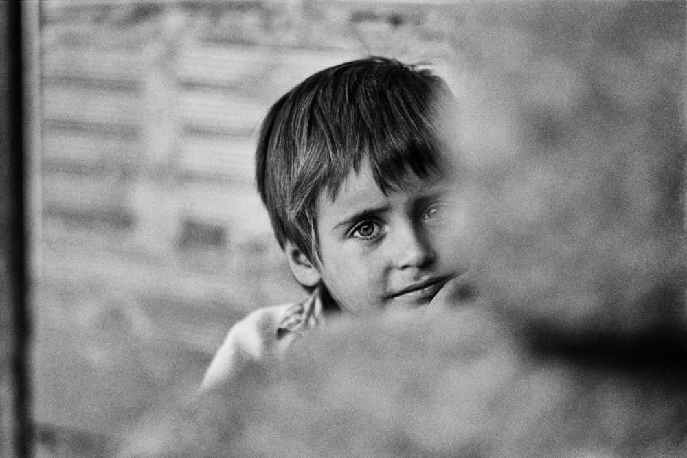 Pensive Young Boy by Eduardo Perez Sanchez — canvas wall art