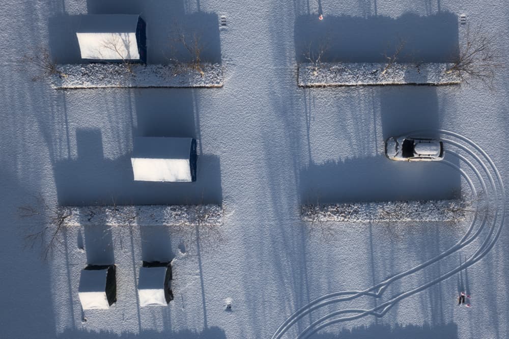 Winter Car Tracks by Xiaoyang Wang — canvas wall art