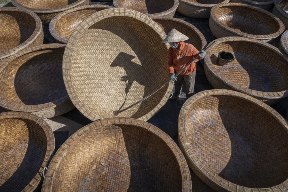 Crafting Conical Baskets by Joseph Ng — canvas wall art