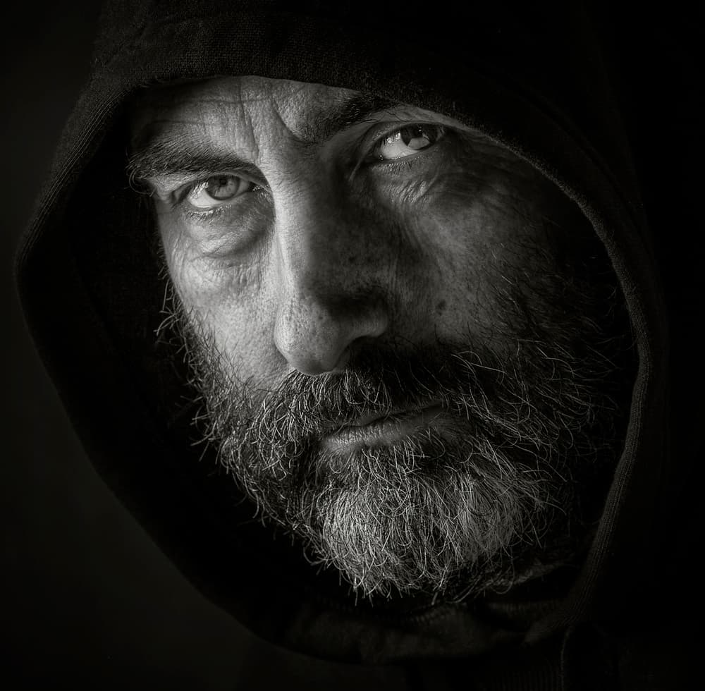Intense Hooded Gaze by Catchlight Studio — canvas wall art