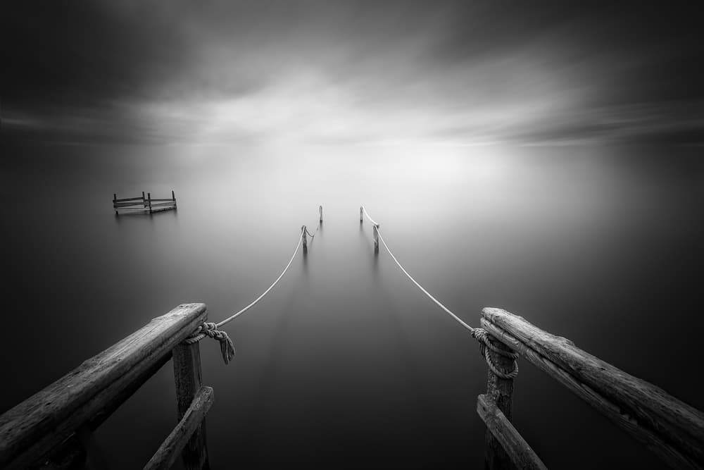 Moody Pier Horizon by Jose Antonio Triviño Sanchez — canvas wall art