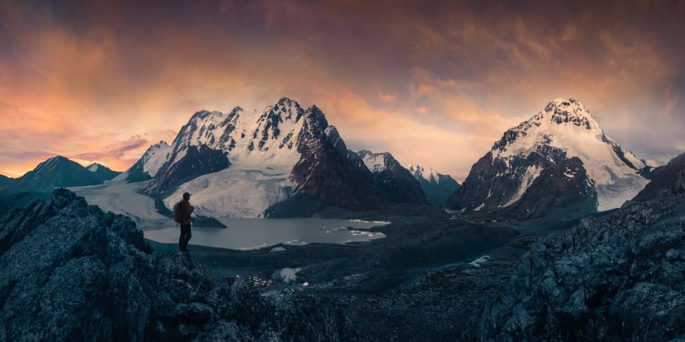 Hiker Overlooking Glacial Lake by qiye — canvas wall art