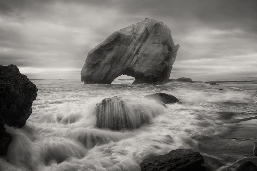 Moody Sea Arch by Xiaoyuan Xu — canvas wall art