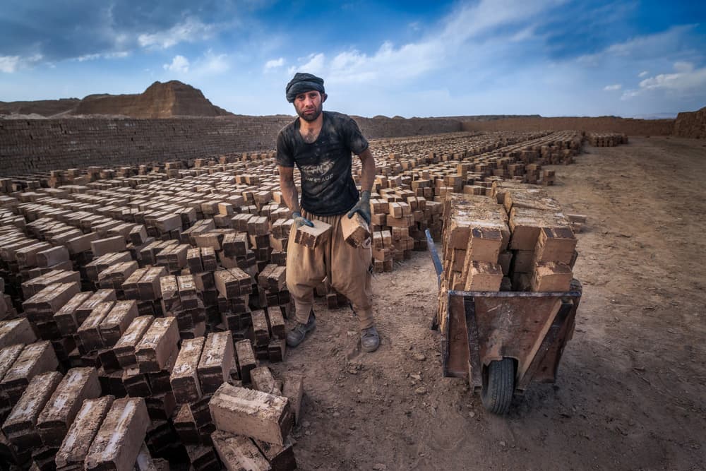 Brickyard Worker by Babak Mehrafshar — canvas wall art