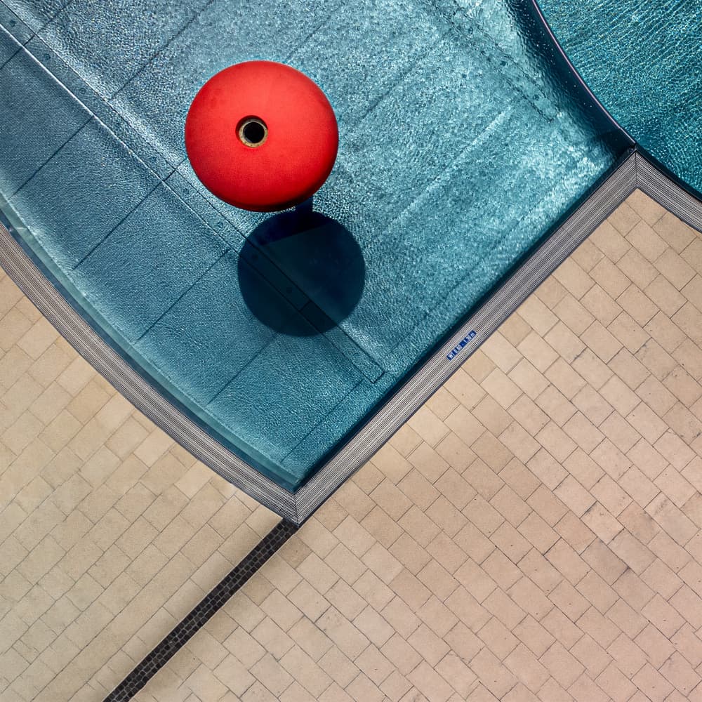Red Ball Blue Pool by Stephan Rückert — canvas wall art