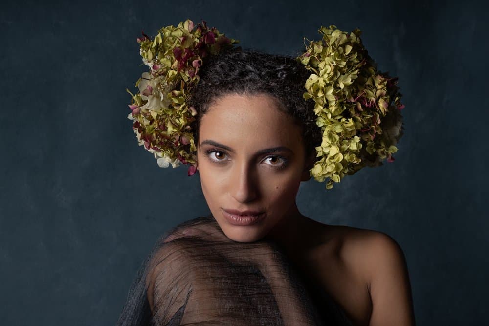 Dark Floral Woman by Joan Gil Raga — canvas wall art