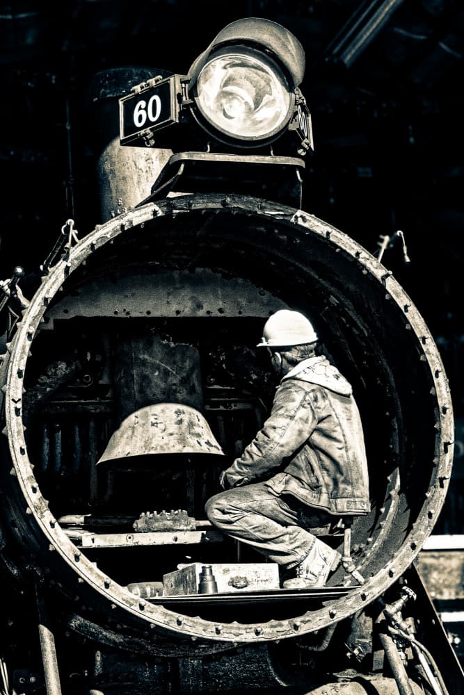 Worker Inside Steam Train by Patrick Compagnucci — canvas wall art
