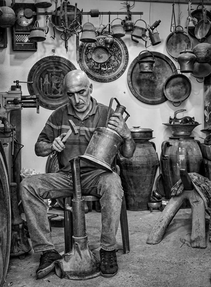 Artisan At Work by Bashar Alsofey — canvas wall art