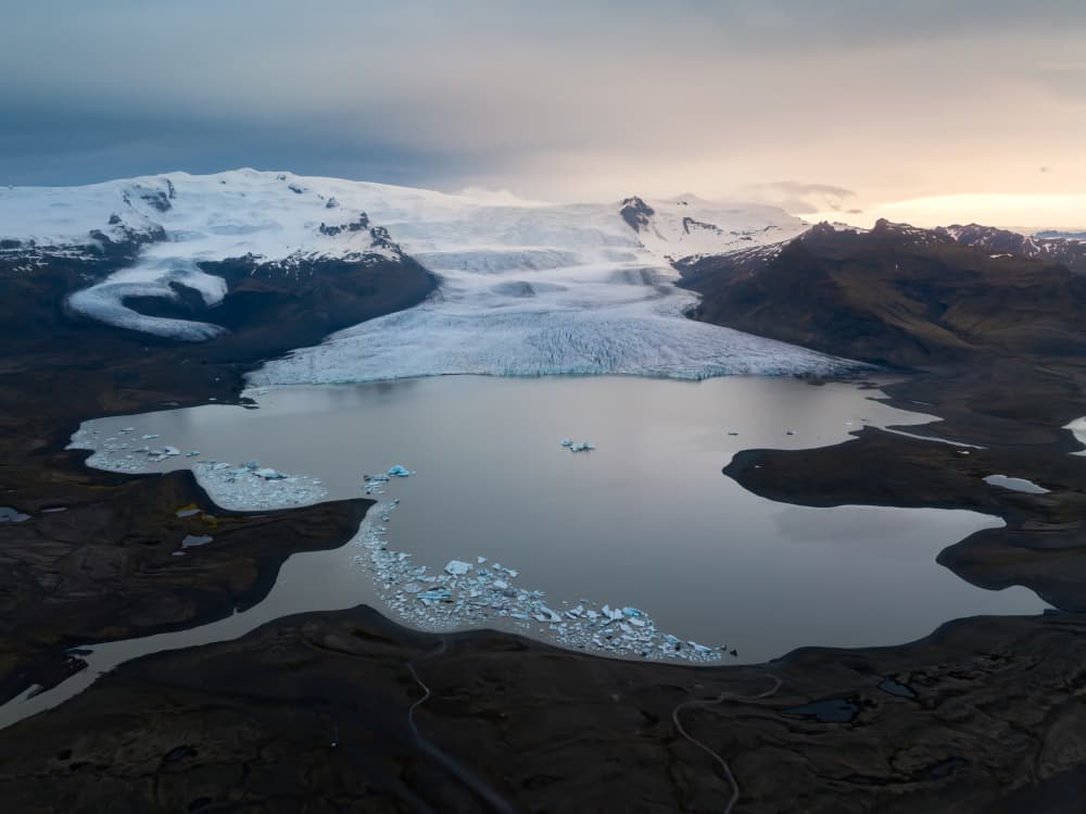 Dramatic Glacial Lagoon by Yongnan Li （李永男） — canvas wall art