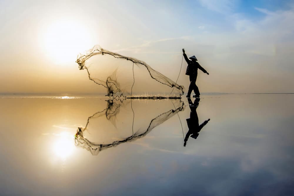 fisherman by Ali Can — canvas wall art