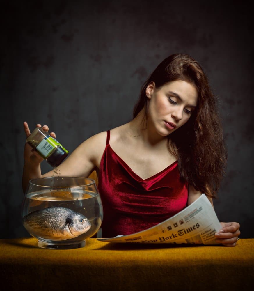 Pensive Woman Fish Newspaper by Franky De Meyer — canvas wall art