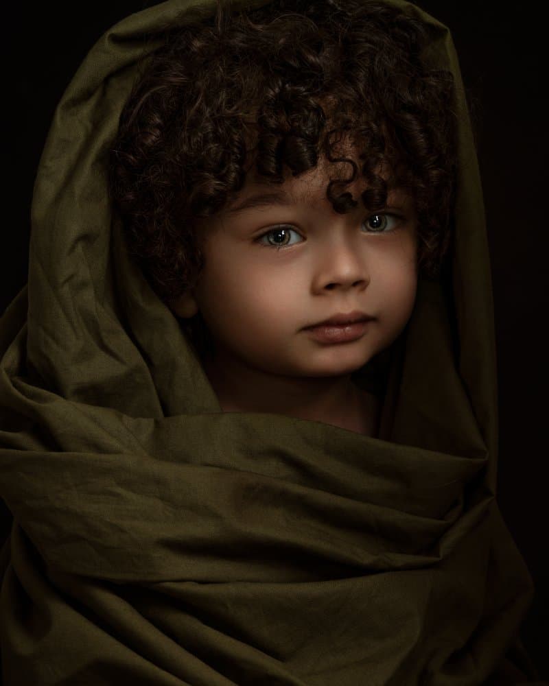 Pensive Young Boy by Ali Sahebi — canvas wall art