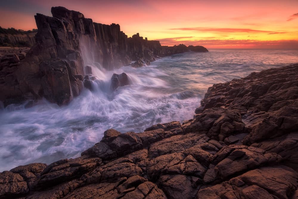 Dramatic Coastal Sunset by Joshua Zhang — canvas wall art