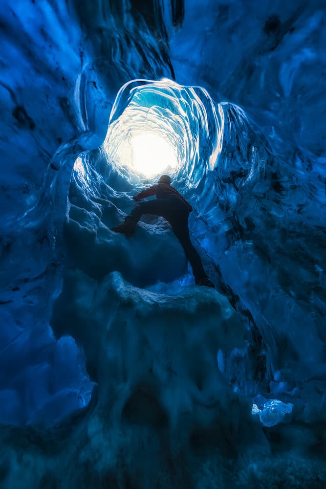 Blue Ice Cave Ascent by David Martin Castan — canvas wall art