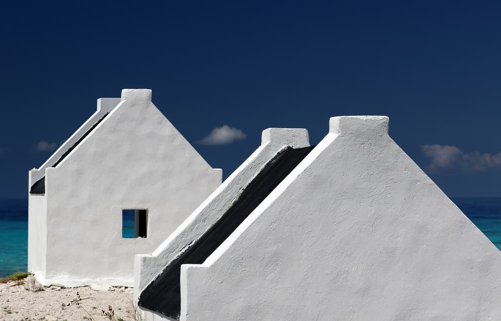 White Houses Blue Sea by Hans-Wolfgang Hawerkamp — canvas wall art