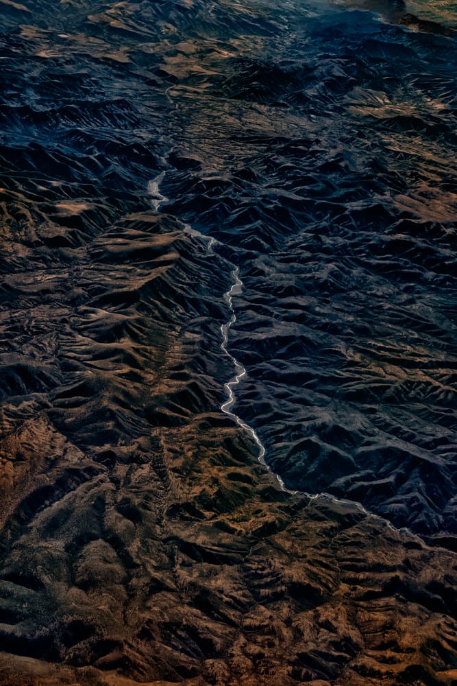 Winding River Through Mountains by Liyun Yu — canvas wall art