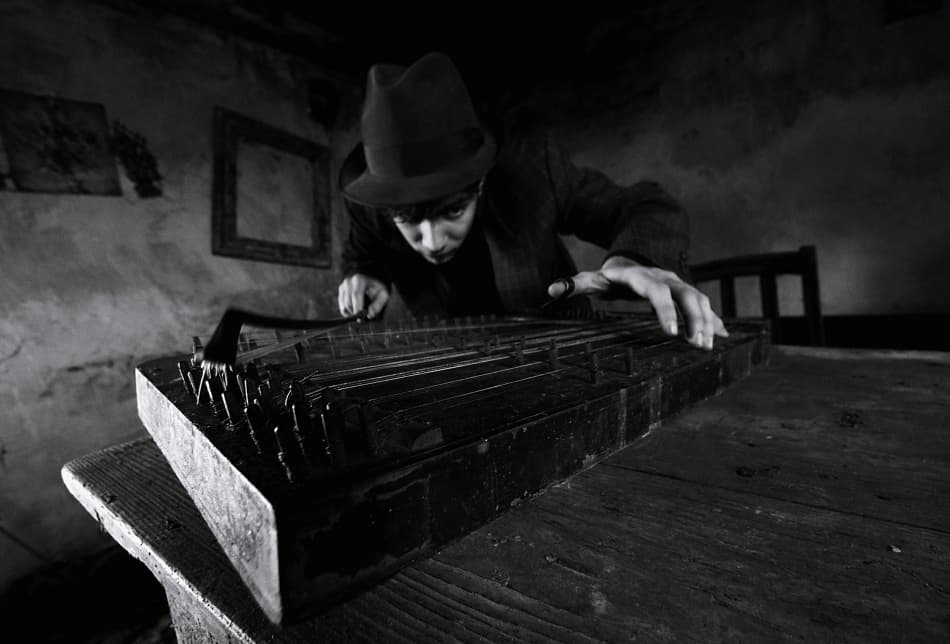 Man Playing Vintage Instrument by mario grobenski - psychodaddy — canvas wall art