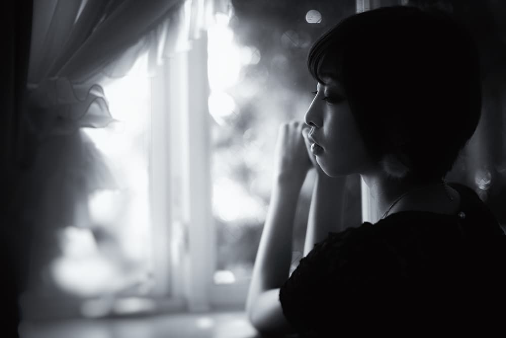 Pensive Woman By Window by Daisuke Kiyota — canvas wall art