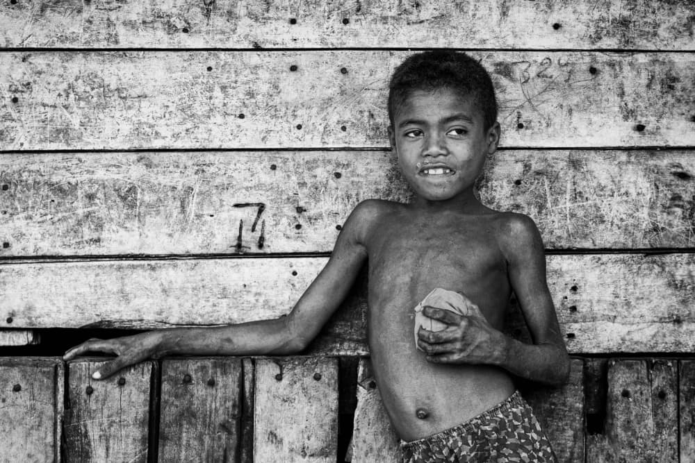 Young Boy Rustic Portrait by António Carreira — canvas wall art