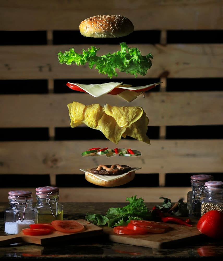 Floating Burger Layers by Rezamoto — canvas wall art