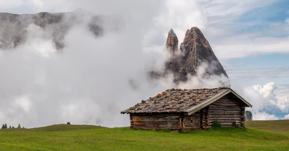 Rustic Cabin Cloud Peaks by Ales Krivec — canvas wall art