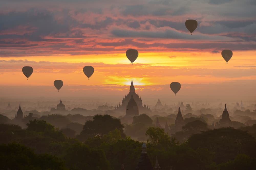 Sunrise Temple Balloons by Sarawut Intarob — canvas wall art