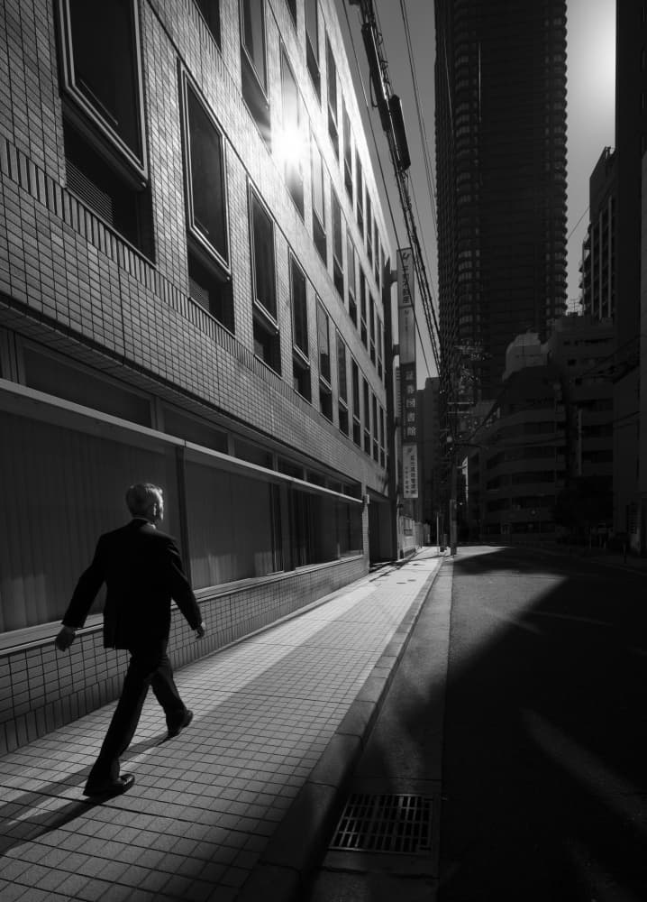 Man Walking City Shadows by Yasuhiro Takachi — canvas wall art