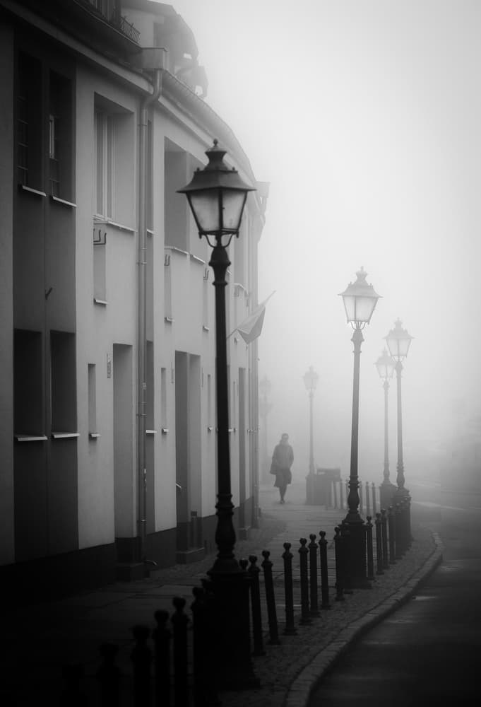 Misty Street with Figure by Anna Niemiec — canvas wall art
