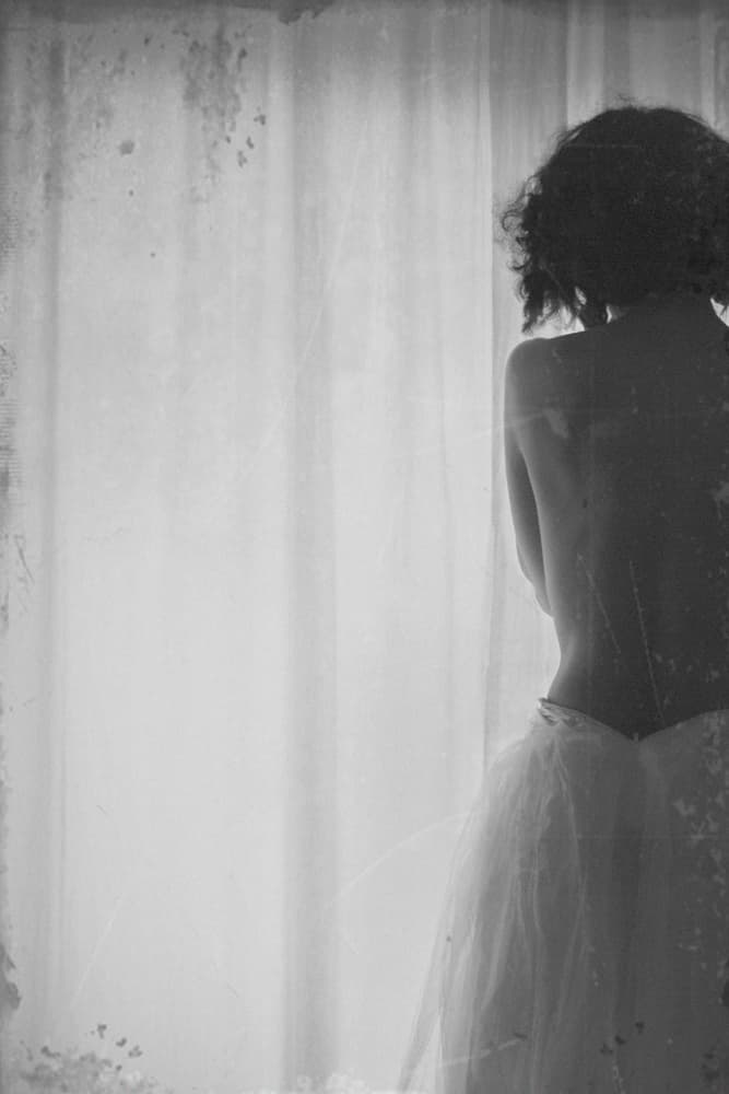 Pensive Woman Gentle Light by Milena Seita — canvas wall art