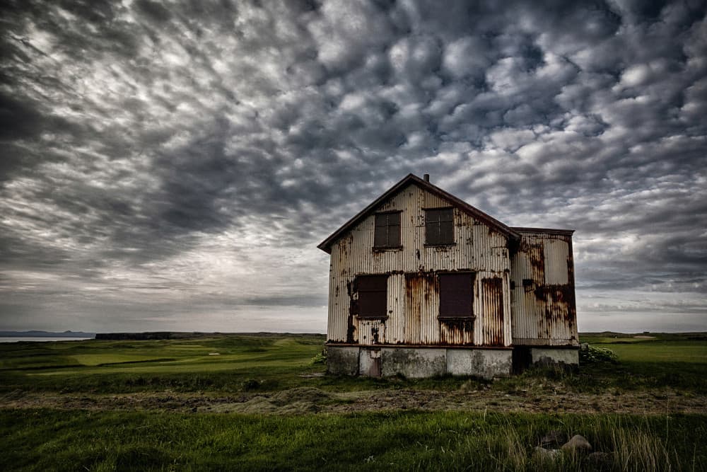Abandoned House Under Clouds by Þorsteinn H. Ingibergsson — canvas wall art