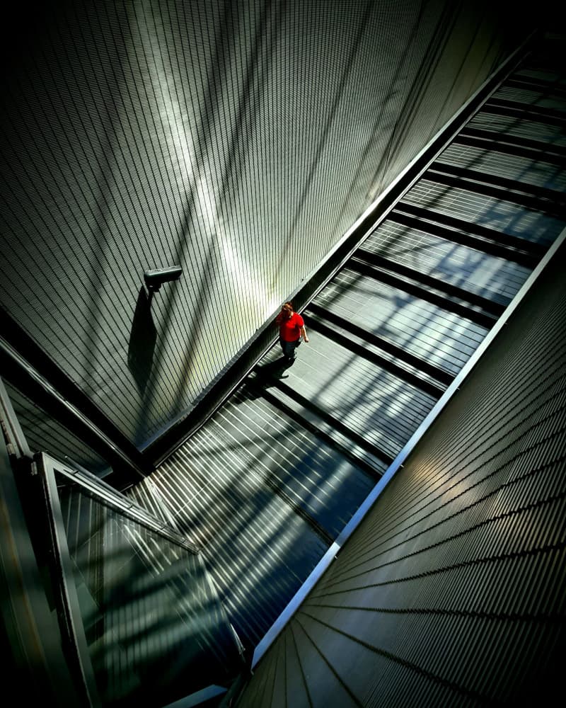 Dramatic Architecture Red Man by Antonio Grambone — canvas wall art