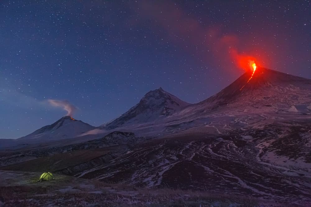 Camping Under Erupting Volcanoes by Denis Budkov — canvas wall art