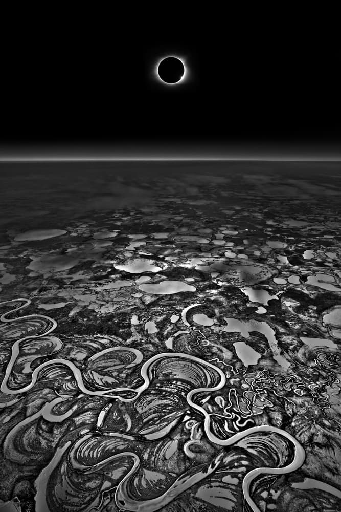 Solar Eclipse Over Earth by Liyun Yu — canvas wall art