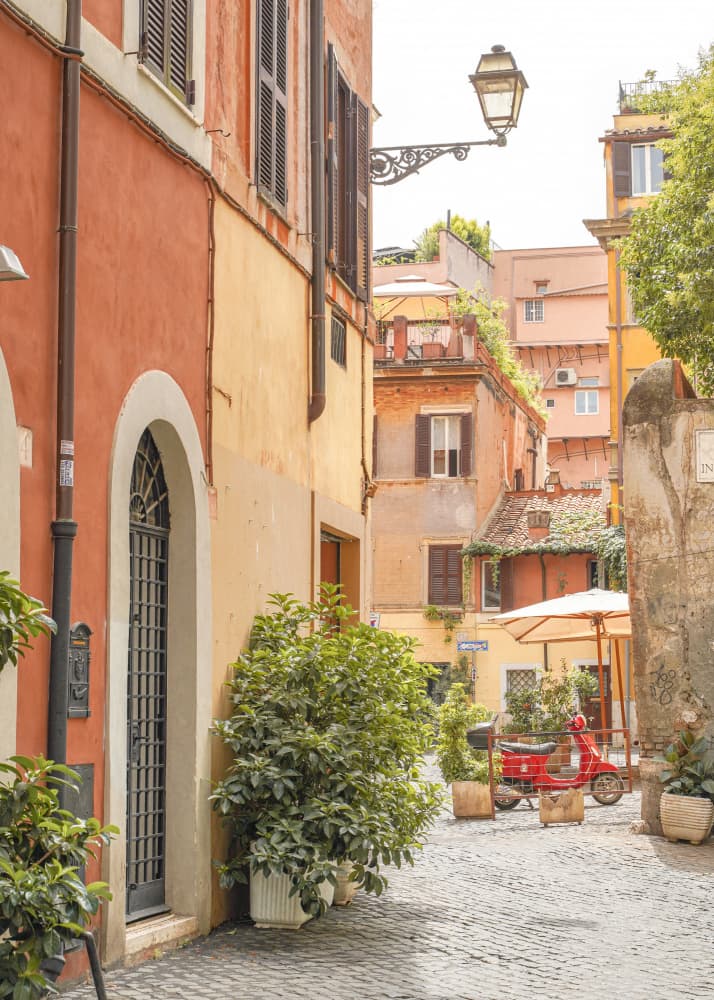 Red Vespa on Cobblestone by Henrike Schenk — canvas wall art