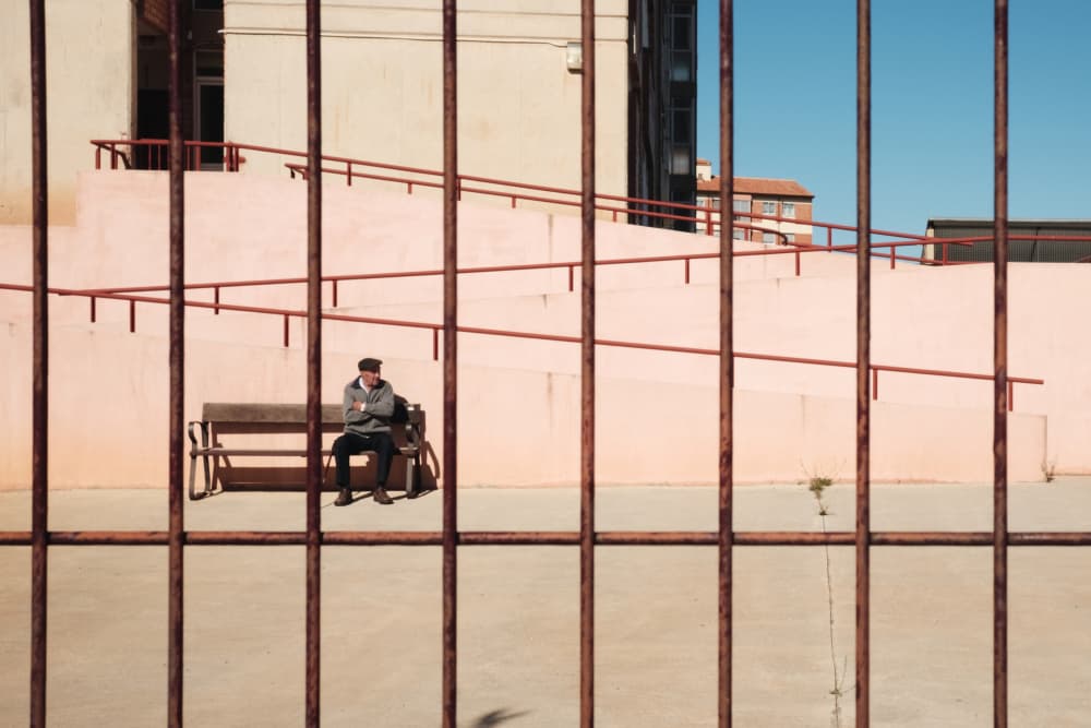 Lonely Man Behind Fence by Sergii Puchkov — canvas wall art