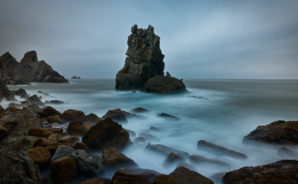 Misty Coastal Rock Formations by Sergio Cameno — canvas wall art