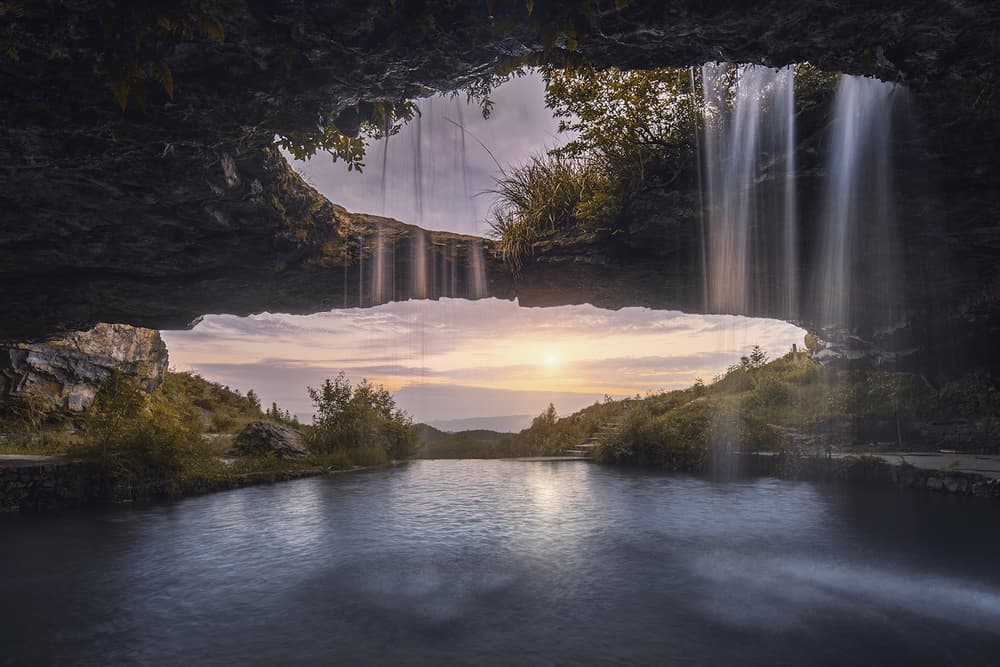 Cave Waterfall Sunset by TIANQI — canvas wall art