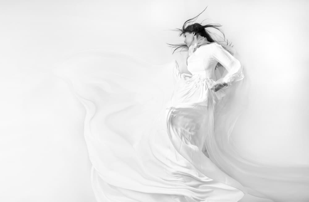 Ethereal Woman Flowing by Marjan Taghipour — canvas wall art