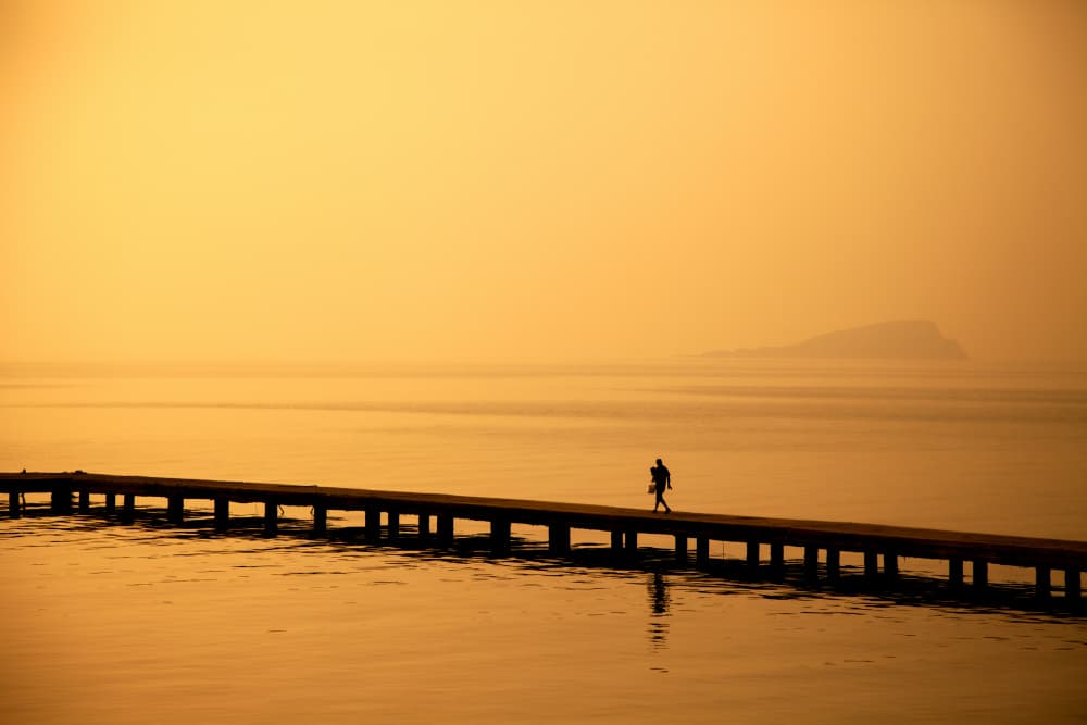Golden Hour Pier Walk by Seray AK — canvas wall art