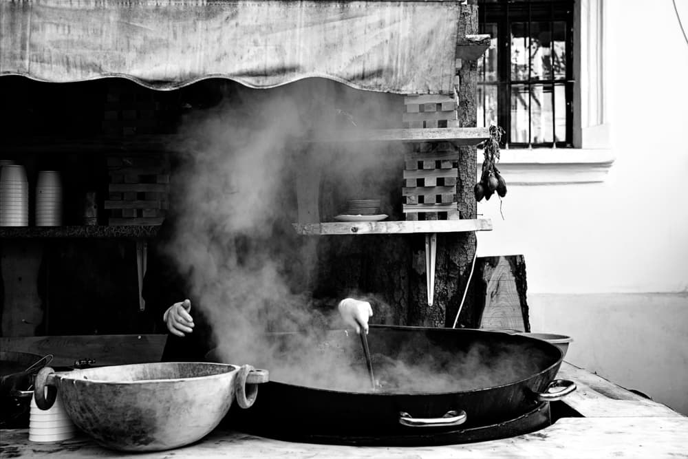 Steaming Hot Market Food by Eyal Amer — canvas wall art