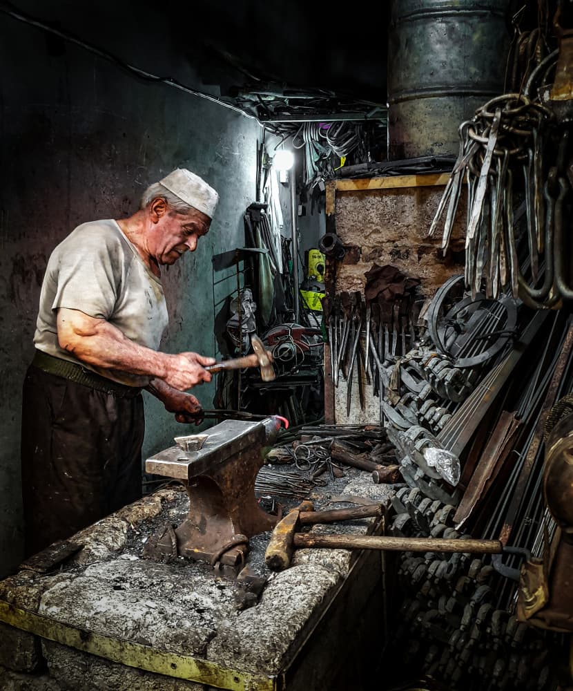 Blacksmith At The Forge by Bashar Alsofey — canvas wall art